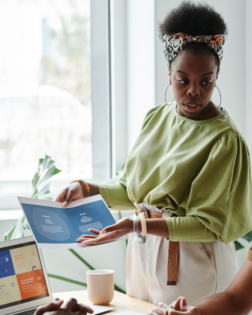A business consultant discussing a project with a client